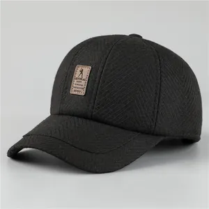 Winter baseballpet voor heren in zwart corduroy met dikke oorbescherming en warme voering