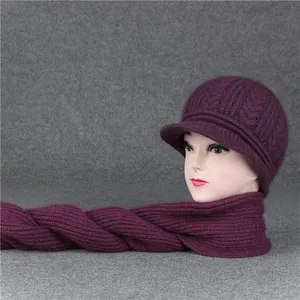 Detail of purple knit hat and scarf set with cable pattern and plush lining texture
