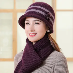 Elderly women's winter knit beanie hat and scarf set in burgundy with floral detail