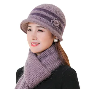 Women's winter purple knit hat and scarf set with floral detail and warm lining