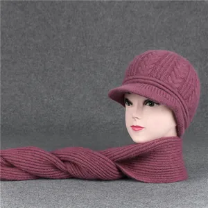 Close-up of purple cable knit texture on winter hat and scarf set for older women