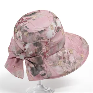 Pink floral wide brim sun hat for women with bow decoration and gold grid stitching
