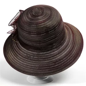 Detailed view of the purple striped sun hat with elegant organza bow and beadwork