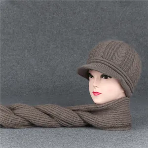 Detail view of brown knit hat and scarf set with thick cable texture and soft warm lining