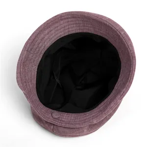 Detailed top view of purple bucket hat showing fabric texture and inner black lining