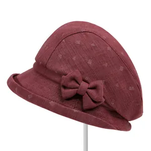 Elegant dark red floral print sun hat for elderly women with decorative bow detail