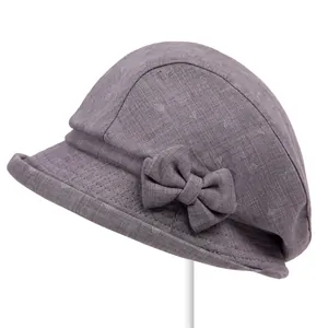 Elegant grey-purple cotton sun hat for elderly women with bow detail and geometric print
