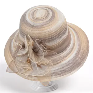 Elegant wide-brim sun hat for women with organza flower detail and pearl accents