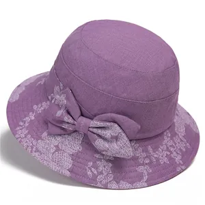 Elegant purple wide-brim sun hat for elderly women with floral embroidery and bow detail