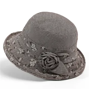 Cappello cloche vintage da donna color talpa con tesa floreale e rosa in tessuto