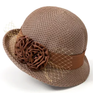 Elegant khaki straw cloche hat with floral decor and golden mesh veil for women