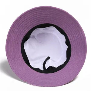 Top view of purple sun hat interior showing white lining and black sweatband detail