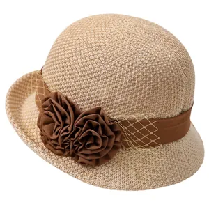 Elegant light brown woven cloche sun hat with vintage fabric flowers and mesh detail