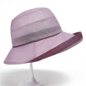 Detailed view of lightweight light purple sun hat with elegant layered mesh design for women