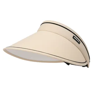 UPF50+ wide brim beige sun visor hat for women with black trim and brand tag