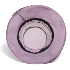 Internal view of purple sun hat showing breathable mesh lining and black sweatband detail