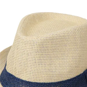 Detail of the woven texture and navy blue decorative band on the beige sun hat for men