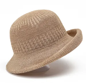 Close-up of the intricate hollow knit texture on this khaki summer sun bucket hat