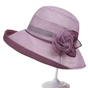 Elegant lavender sun hat for women with a large floral decoration on breathable mesh fabric