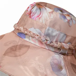 Detail view of jacquard floral pattern and woven braid on women sun hat brim