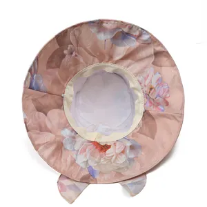 Detail of floral sun hat featuring breathable mesh lining and adjustable inner drawstring