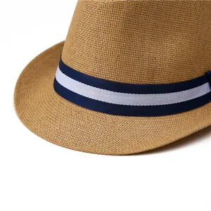 Close-up of finely woven paper straw texture with blue and white striped ribbon band