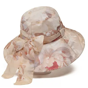 Champagne floral sun hat for women with wide brim and elegant side bow decoration