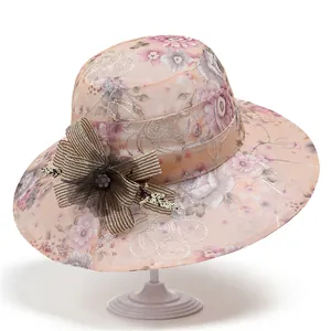 Elegante cappello da sole floreale per donne anziane con fiocco e tesa larga