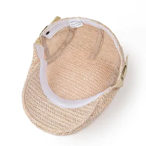 Detail of internal sweatband and 100% polyester care label on woven beret hat