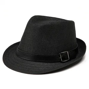 Detailed macro view of black woven straw fedora hat featuring a leather band with metal buckle
