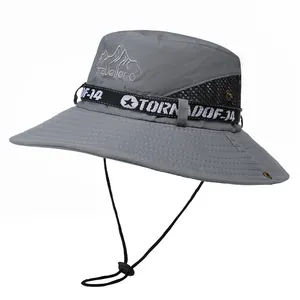 Detail of grey outdoor sun hat showing Travellero embroidery and breathable black mesh vents