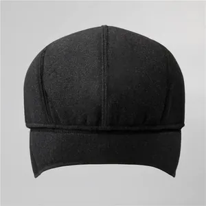 Winter wool newsboy cap for men with ear flaps and warm fleece lining in black