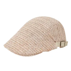 Light beige woven flat cap with retro mesh texture and adjustable bronze buckle strap