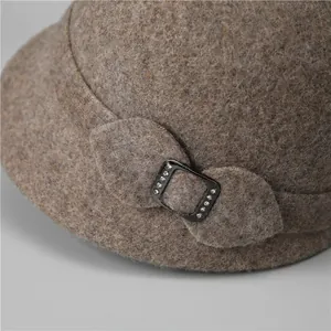 Elegant brown wool winter cloche hat for elderly women with rhinestone buckle detail