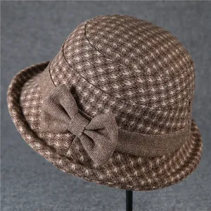 Vintage brown houndstooth wool bucket hat for women with a warm bow decoration