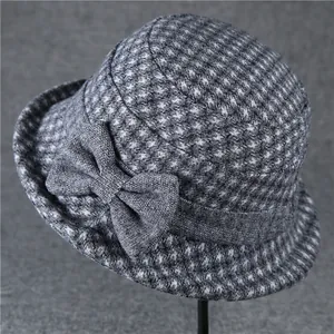 Vintage houndstooth wool bucket hat for older women with stylish bow and warm lining