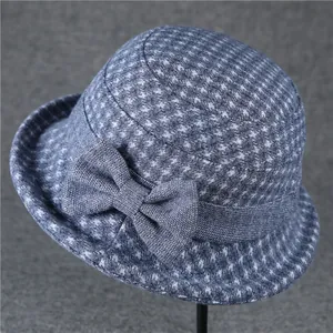 Elegant thick wool felt bucket hat for women featuring blue plaid texture and bow detail
