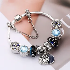 Blue starry sky beaded bracelet with crescent moon and sparkling star pendants