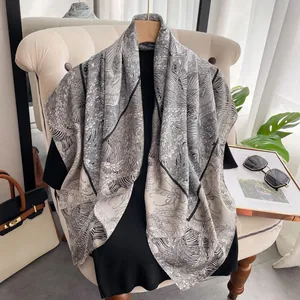 Silk-like large square scarf with monochrome jungle and animal print in soft beige