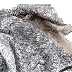 Luxurious black and white botanical feather print silk square scarf with hand-rolled edges