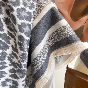 Thick leopard print cashmere shawl with striped details and fringe edges for women