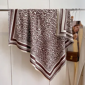 Thick leopard print cashmere square scarf with tassel border and stripe detail