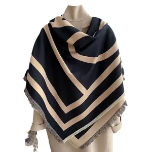 Navy and beige cashmere feel shawl with geometric V-stripes and tassel edges