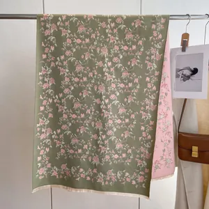 Floral cashmere-like scarf with rose print in grey-green and pink with tassel edges