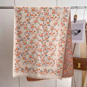 Double-sided floral cashmere scarf in beige and brown with orange rose patterns