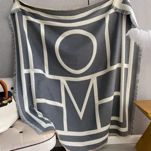 Thick grey and cream knitted shawl with fringe and HOME letter pattern for women