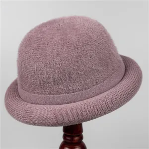 Elegant mauve winter knitted hat for elderly women with warm plush fur and rolled brim