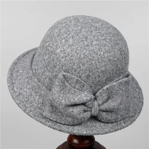 Elegant grey wool cloche hat for women with large bow and silver stitched edges