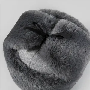 Deep grey winter trapper hat for men featuring thick faux fur and thermal ear flaps