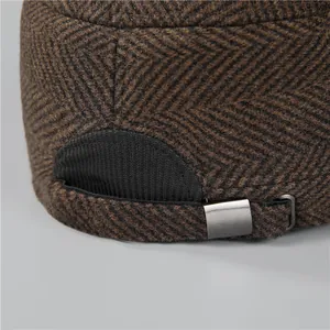 Winter flat top cap with brown herringbone tweed fabric and adjustable metal buckle back